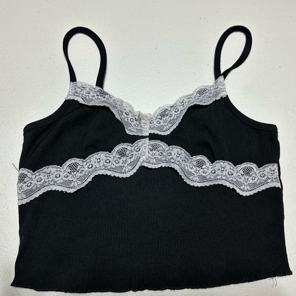 Super cute ribbed and laced going out top. Measurements in photos.